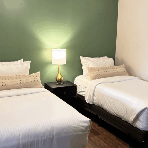 Twin Beds In Farmhouse On The River Room